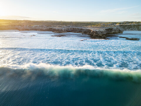 Wave breaking onto remote coastline. South Australia.
