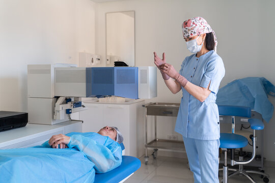 Surgeon Prepares for Medical Procedure in Clinic Room