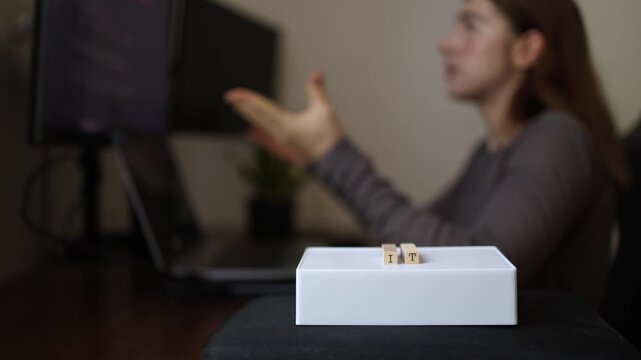 Young woman thinking through difficult technical challenge while learning digital skills preparing freelance projects and building career in technology from home