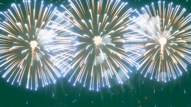 Bright festive fireworks exploding in the dark night sky creating beautiful patterns of orange and blue light in this vibrant motion video animation sequence perfect for celebrating various joyous hol