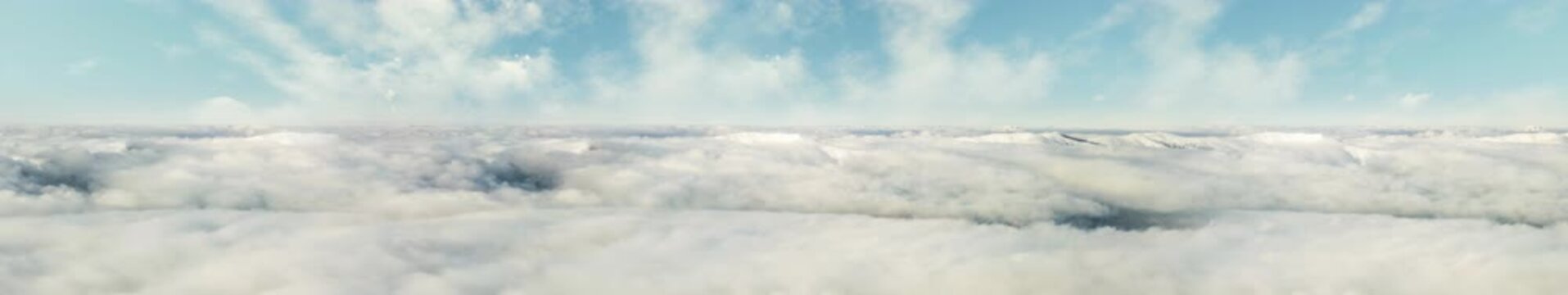 Aerial View Above White Clouds with Snow-Capped Mountain Peaks Blue Sky Panorama &mdash; Widescreen Loop