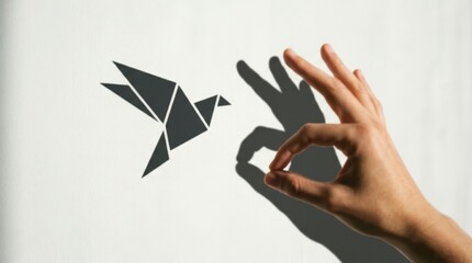 Fototapeta premium Hand casting bird shadow with index finger