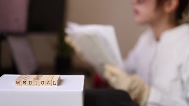 Young medical laboratory intern reviews patient records and laboratory reports while preparing documentation for clinical consultation in a modern healthcare facility