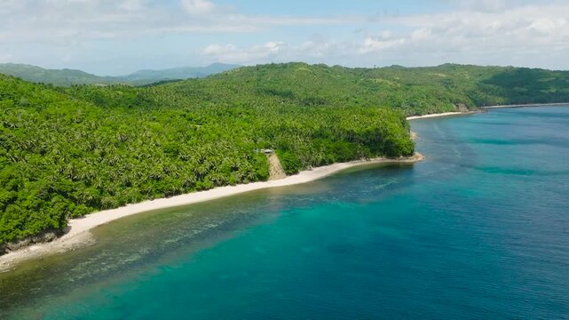 Tropical Beach with white sand and blue sea, aerial view. Santa Fe, Tablas, Romblon. Philippines.