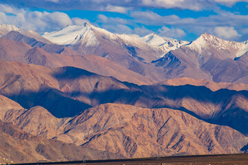 Obraz premium Scenic beauty of Himalayan mountains near Leh Airport, Ladakh, India. Leh is the capital of Ladakh, Jammu and Kashmir and known for natural landscape attracting tourist from all over India and world.