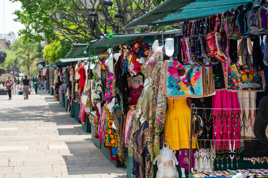Colorful artisan market stalls with traditional crafts and clothing in Guadalajara Mexico