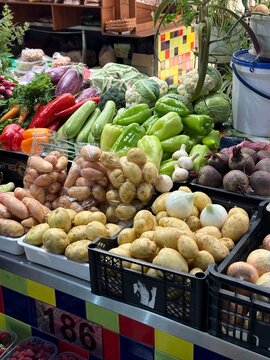 Fresh Vegetables And Potatoes Displayed At Local Farmers Market