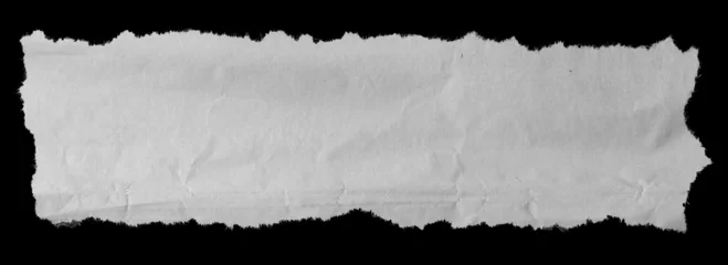 Torn paper on black © Stillfx