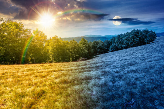 day meet night above carpathian mountain field. view of countryside landscape with valley behind the forest on the hill. sun and moon over clouds on a sky. autumn equinox background for astrology