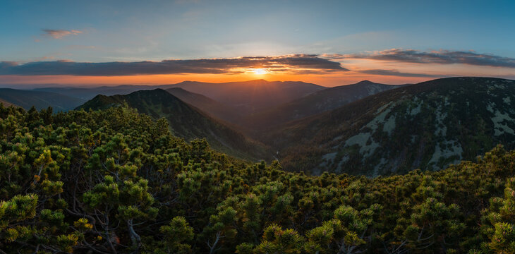 Beautiful valley view from Kozi hrbety during sunset with deep green forests