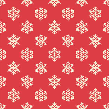 Small white snowflakes isolated on a red background. Seamless pattern. Simple flat vector graphic illustration. Texture.