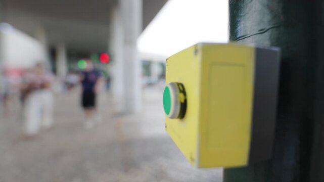 Pedestrian push button for crossing street with traffic lights