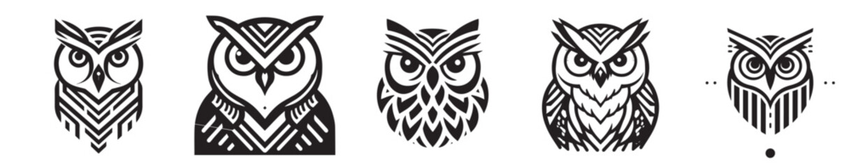 Obraz premium Set of owl head silhouettes vector