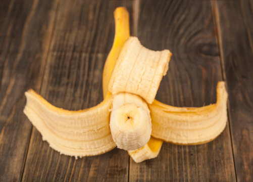 Banana on wooden background.