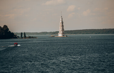 Naklejka premium Historic Church on River Island Surrounded by Water