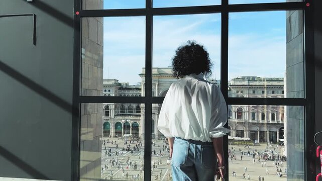 Milan Cityscape: Woman Admires Panoramic Duomo Square View