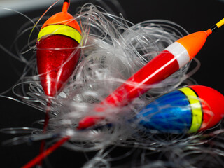 Fishing floats and tangled line representing hobby challenges © VexoraImages