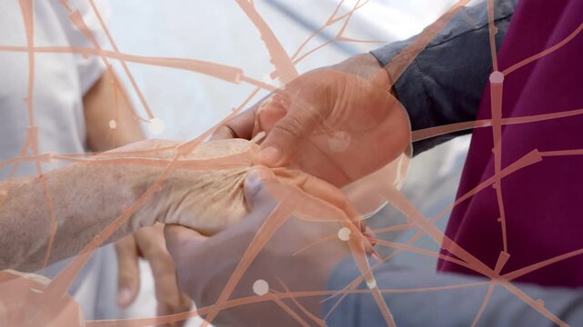 Nurse placing palm on senior woman hand, pressing, holding for care, neural map aligning with hands