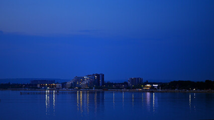 Fototapeta premium An evening view of the beaches and hotels at the beginning of Pionersky Prospekt in Anapa.