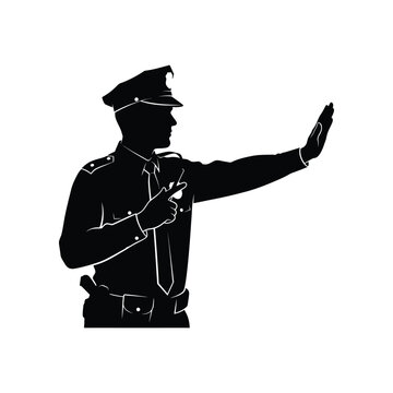 Silhouette of a police officer in uniform signaling stop with hand during a traffic control situation