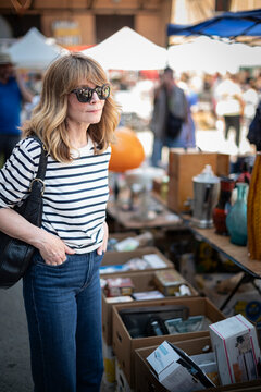 Portrait of stylish mature woman at outdoor market