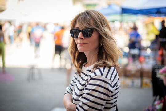 Portrait of stylish mature woman at outdoor market