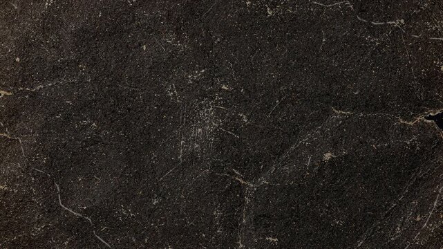 Abstract dark brown and black marble stone surface texture.