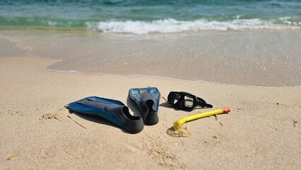 Snorkeling equipment on the shoreline of a sandy beach in Portugal. Summer sea holiday concept. © LadyLensArt 