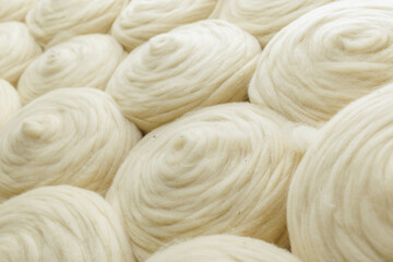 Merino Wool Rolls Ready for Spinning in a Textile Factory © st.kolesnikov