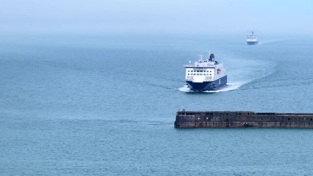 Ferry Approaching Dover Sea Walls Aerial 4K