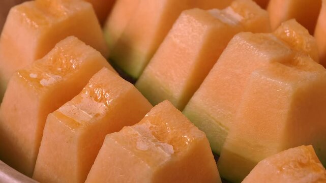 Sliced pieces of fresh sweet cantaloupe melon