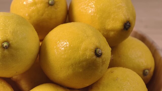 Close-up view of fresh whole yellow lemons