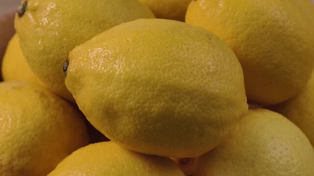 Close-up view of fresh whole yellow lemons