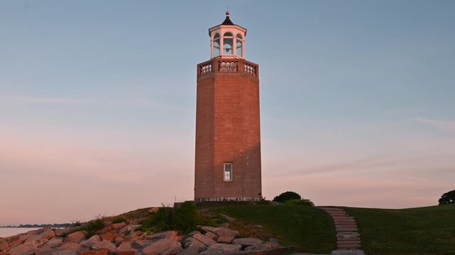 Groton, Connecticut, USA - Low Angle View Of Avery Point Lighthouse At Sunrise