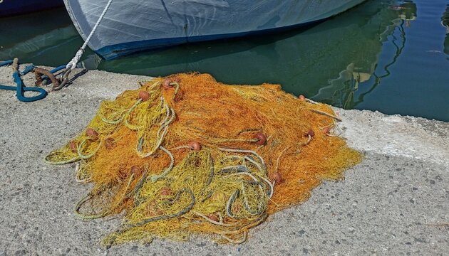 Traditional Fishing Net on the Harbor Quay in Elafonisos, Greece