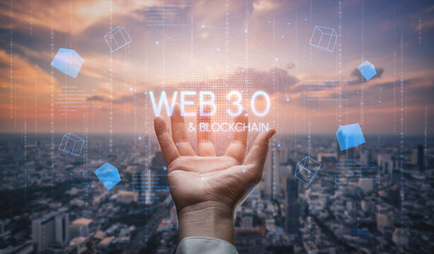 Digital Transformation Concept of Web 3.0 and Blockchain Technology Represented by a Hand Reaching for Data in a Modern Cityscape at Sunset. Entropy.