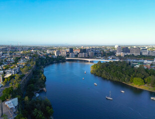 Fototapeta premium Aerial view of Brisbane River and city skyline