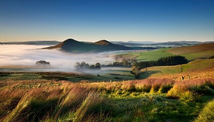 Obraz premium Mist Around The Eildon Hills Galashiels Scottish Borders
