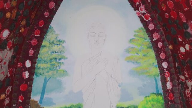 A mural depicting the Buddha is under construction inside Wat Sam Phran temple in Thailand. The walls are decorated with small amulets and offerings.