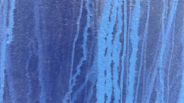 Background of abstract colour blue with texture rust on boat Natural distress on paint surface when exposed to the elements close up moving shot UK 4K