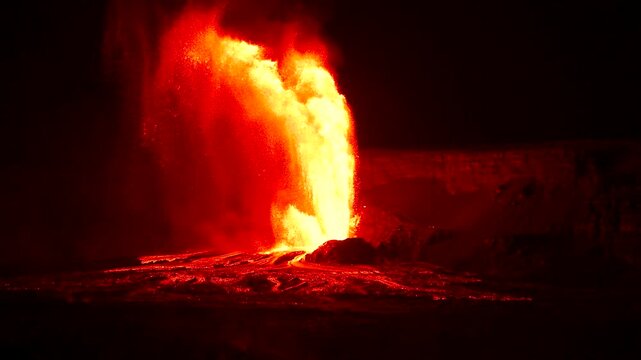 Real time video of lava fountains erupting from Kīlauea Volcano at night in Halemaʻumaʻu Crater, Hawaii Big Island, United States.