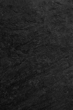 Dark grey black slate background or texture.