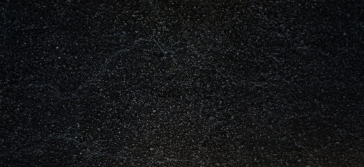 Fototapeta premium Black granite texture background, polished dark marble stone surface, elegant charcoal mineral grain for luxury interior design and architectural backdrop