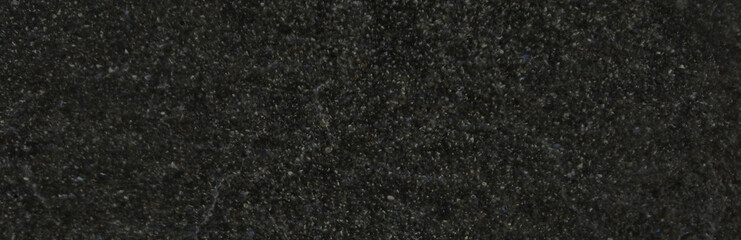 Black felt texture background, dark charcoal grey fabric material, soft matte textile surface for fashion and interior design mockups © Arbaz