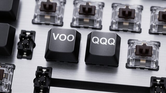 close-up of a custumn-made premium keyboard with two of its keys labeled "VOO" and "QQQ"