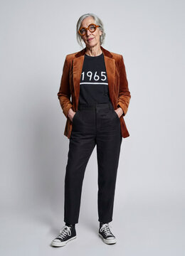 Studio portrait of a confident fashion forward stylish senior woman in the studio 