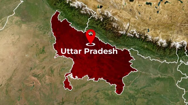 Zoomed in satellite terrain map animation of India highlighting Uttar Pradesh state in red with a red location pin icon and blinking target dot