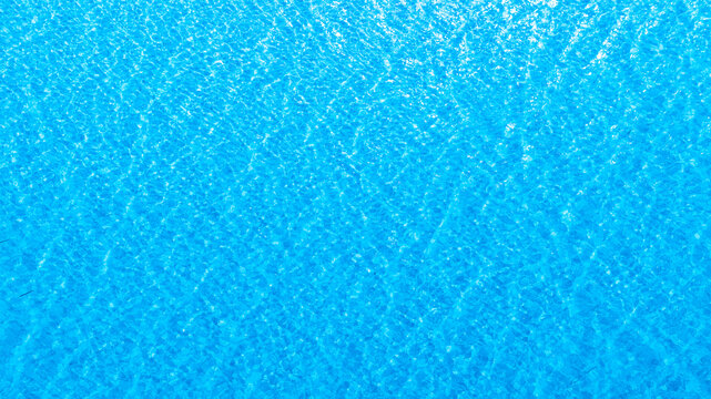 Title	
Top view of deep blue sea water surface with small ripples, aerial drone shot of turquoise ocean texture at island , abstract nature background	
