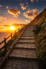 Fototapeta premium Stone stairway ascending toward sunset with golden hour lighting on coastal cliff.