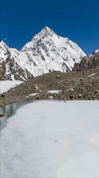 K2 mountain peak, second highest mountain in the world, K2 trek, Pakistan, Asia. Vertical video.
